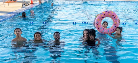 People swimming in a pool