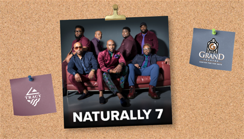Naturally 7 promotional image pinned to a corkboard, featuring seven members of the vocal group posed together, with City of Tracy and Grand Theatre Center for the Arts logos displayed on pinned notes
