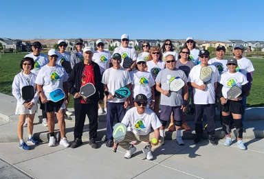 Seniors pickleball group photo after a day of play
