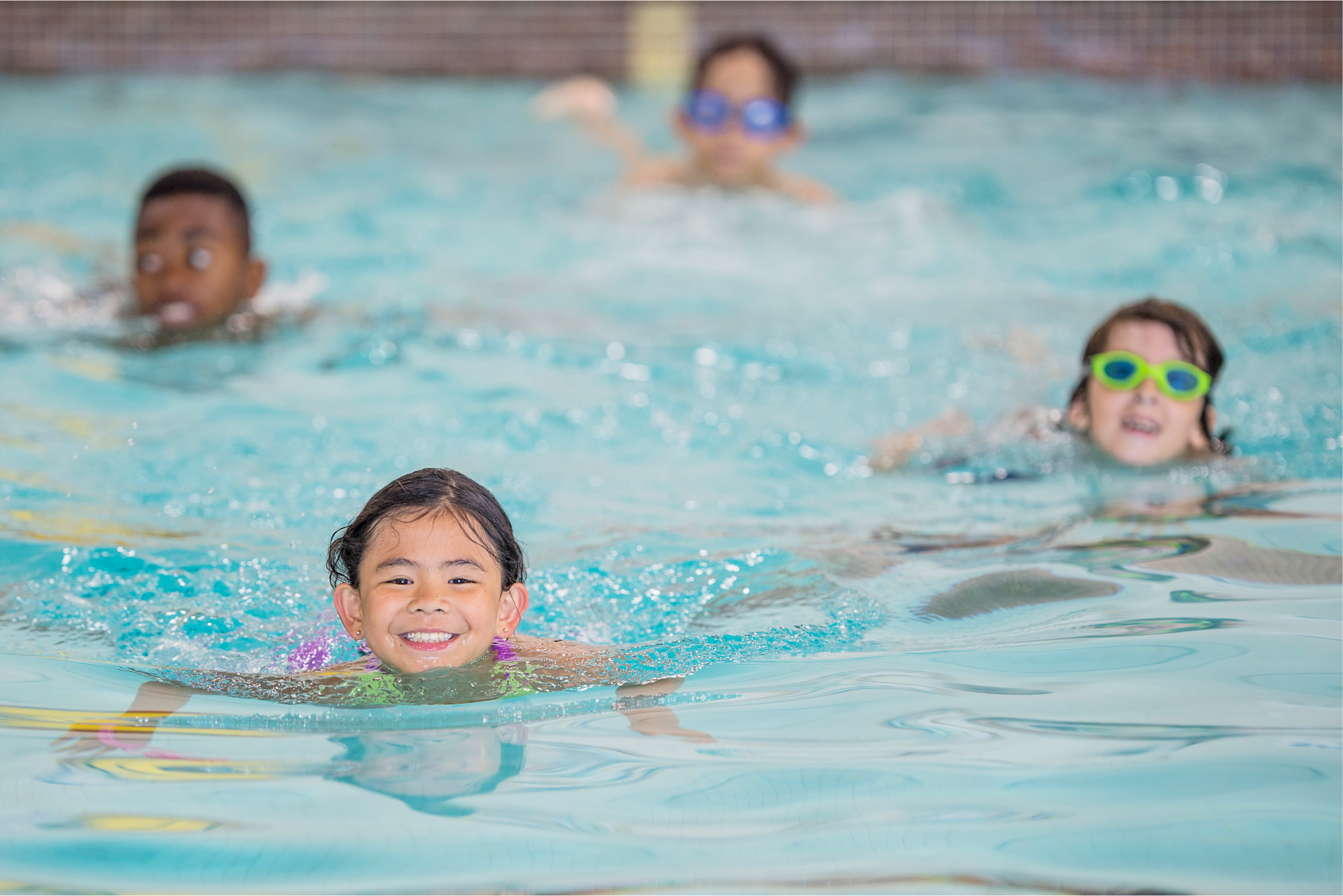 Kids swimming in pool
