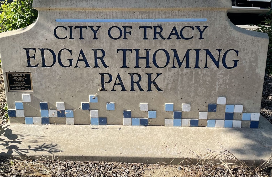 Stone park entrance sign engraved with 
