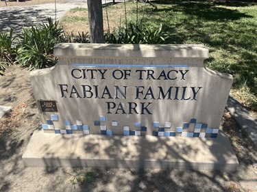 Stone park entrance sign reading 
