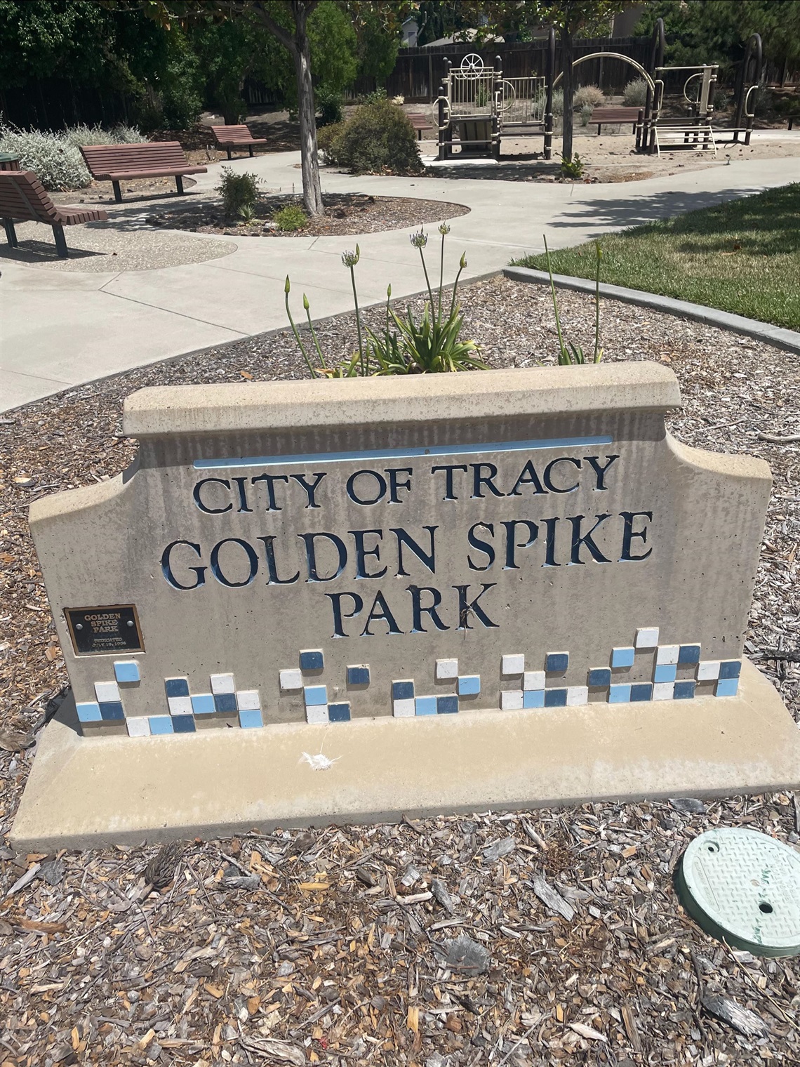 Stone park entrance sign reading 