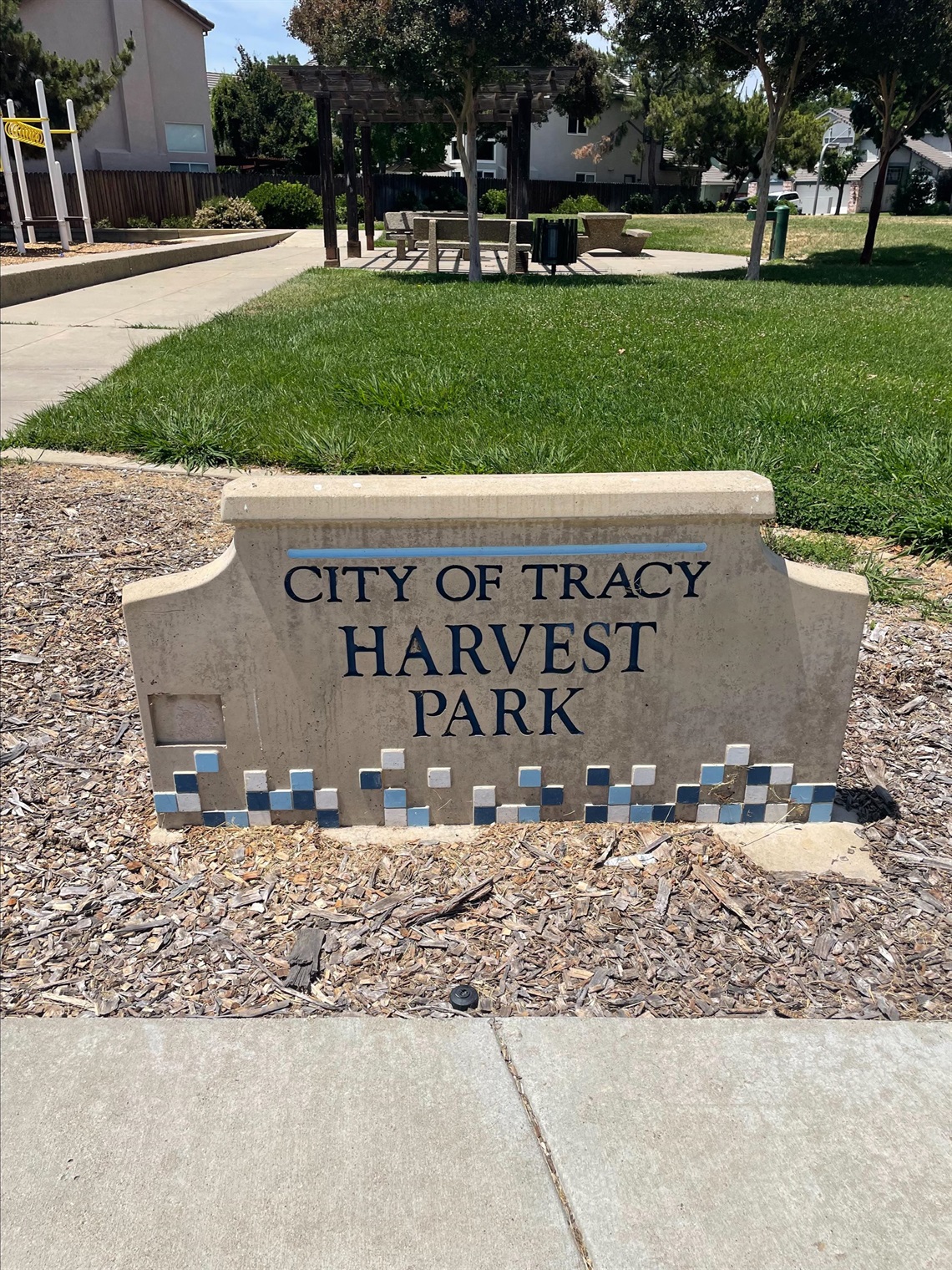 Stone park entrance sign reading 