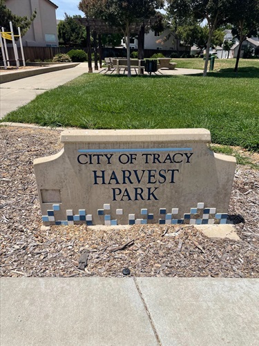 Stone park entrance sign reading 