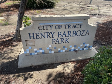 Stone park entrance sign engraved with 