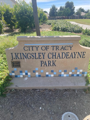 Stone park entrance sign engraved with 