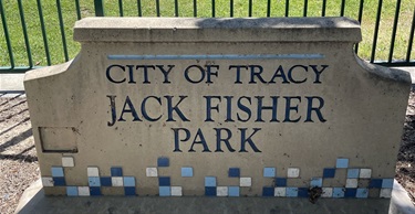 Stone park entrance sign reading 