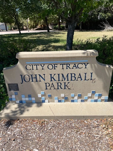 Stone entrance sign reading 