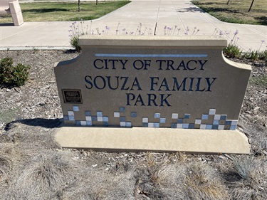 Stone entrance sign reading 