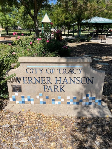 Stone park entrance sign reading 