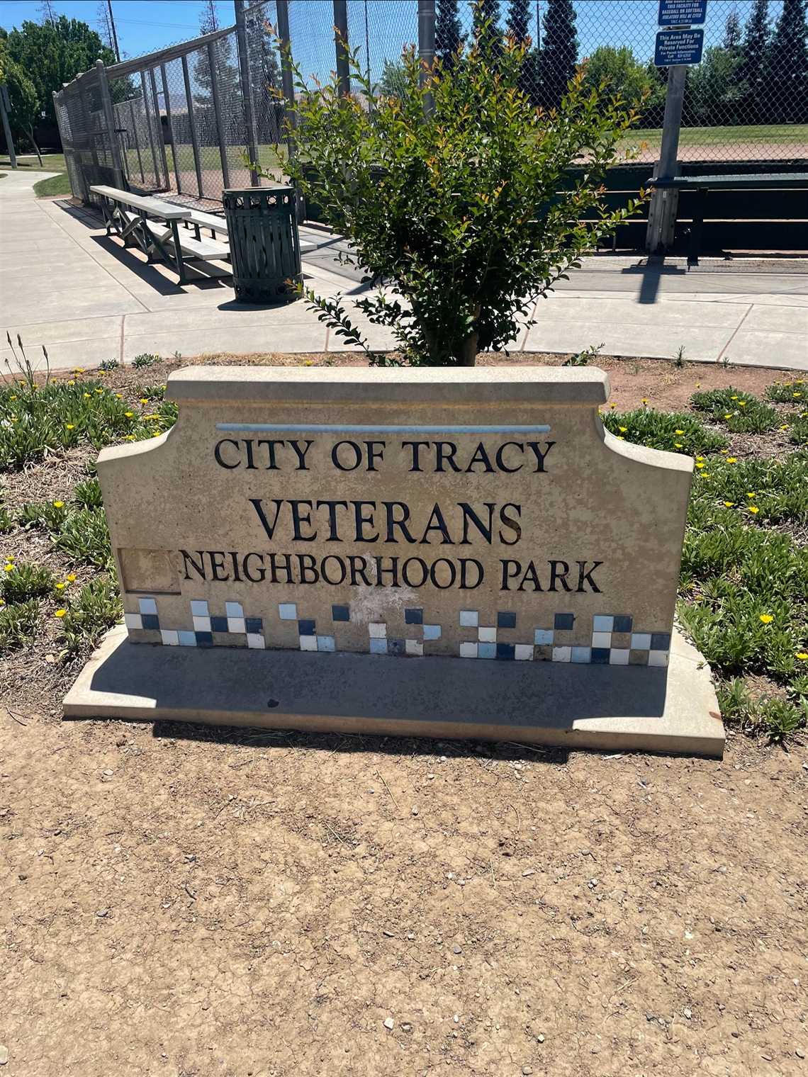 Stone park entrance sign engraved with 