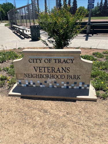 Stone park entrance sign engraved with 