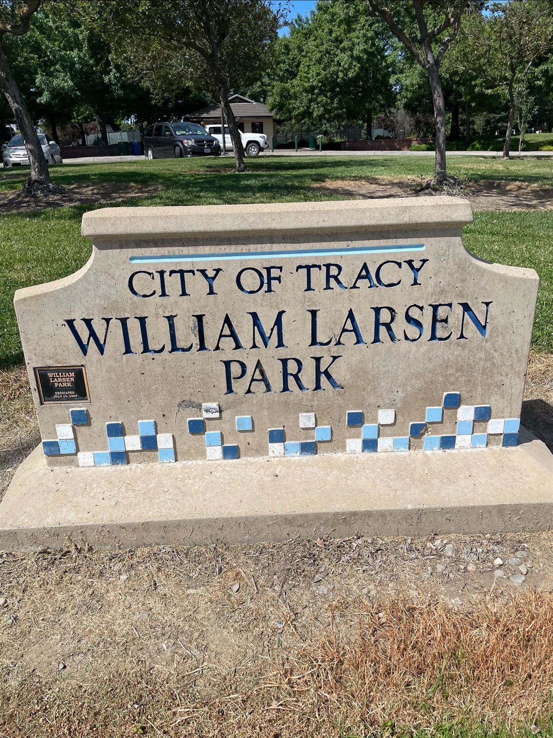 Stone park entrance sign engraved with 