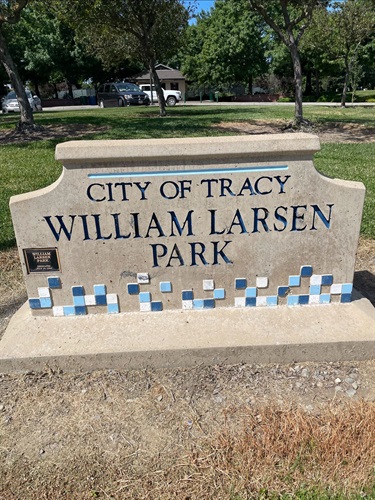 Stone park entrance sign engraved with 
