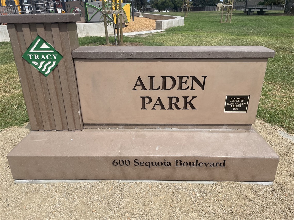 Stone park entrance sign displaying 