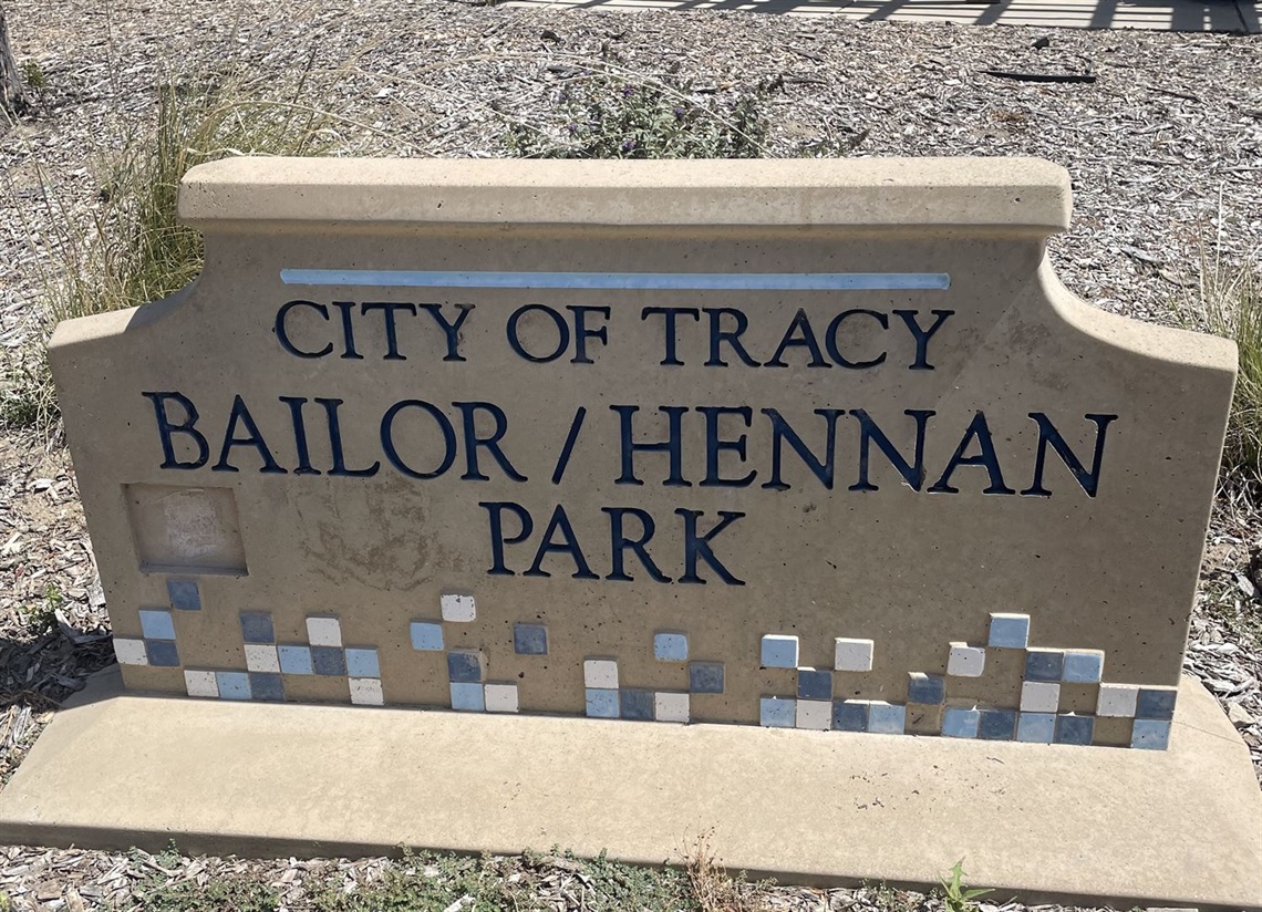 Stone park entrance sign engraved with 