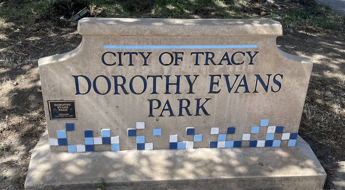Stone park entrance sign engraved with 