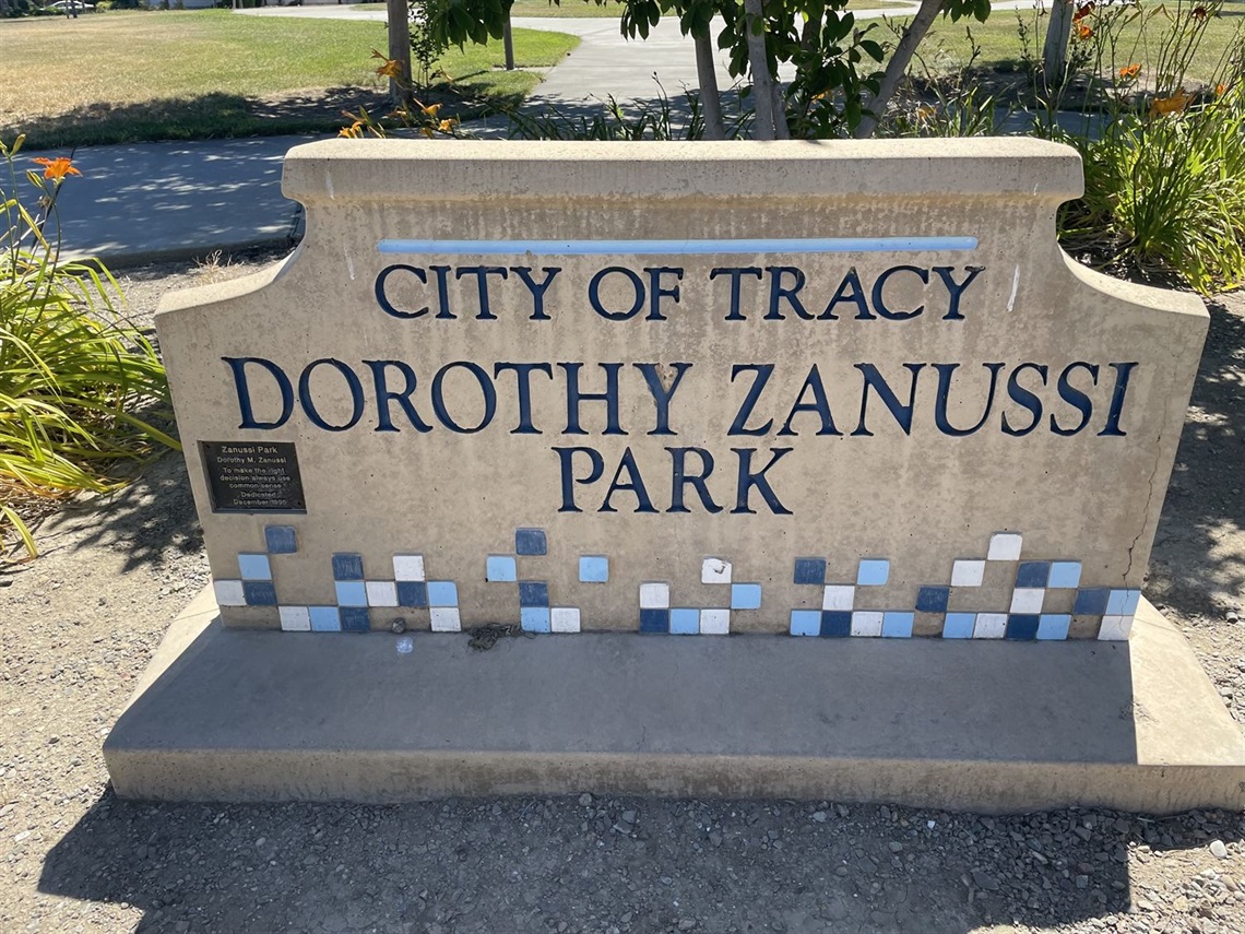 Stone park entrance sign engraved with 