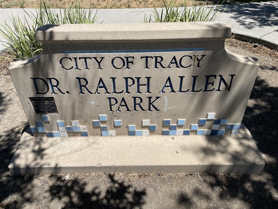 Stone park entrance sign engraved with 