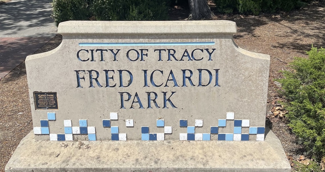 Stone park entrance sign reading 
