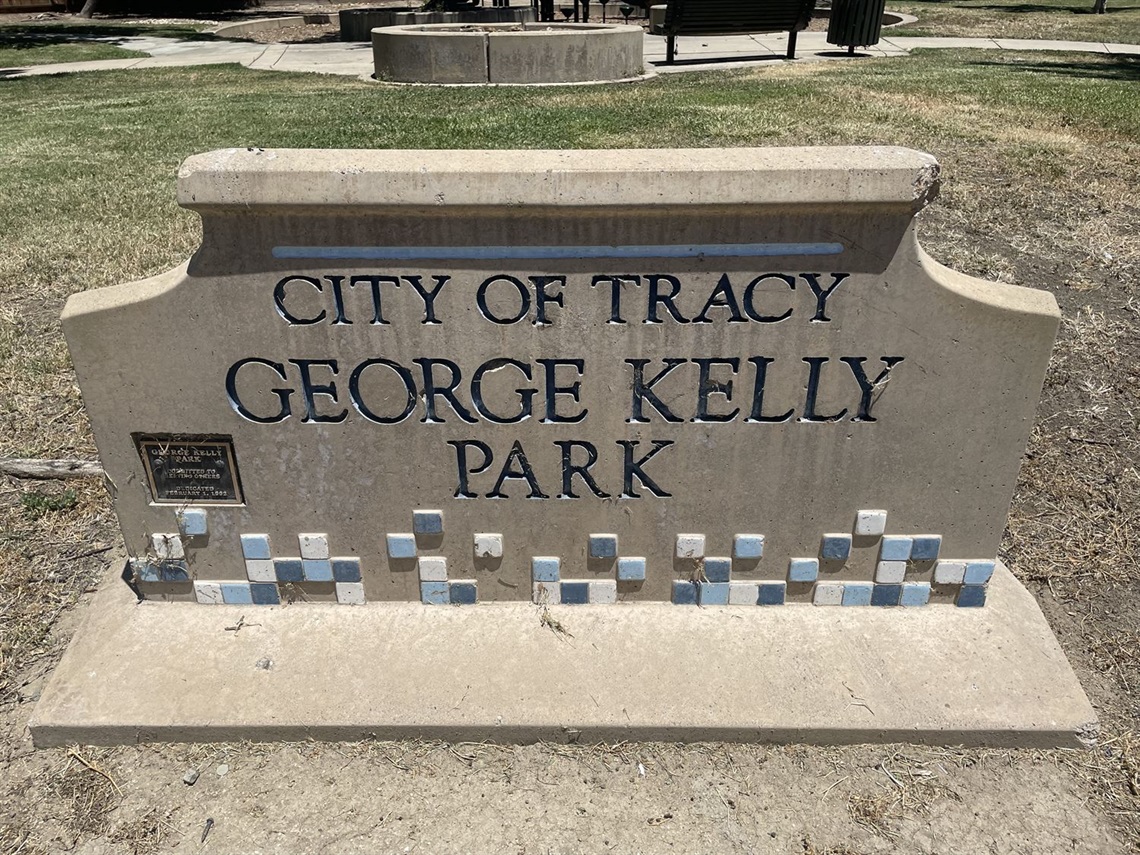 Stone entrance sign reading 