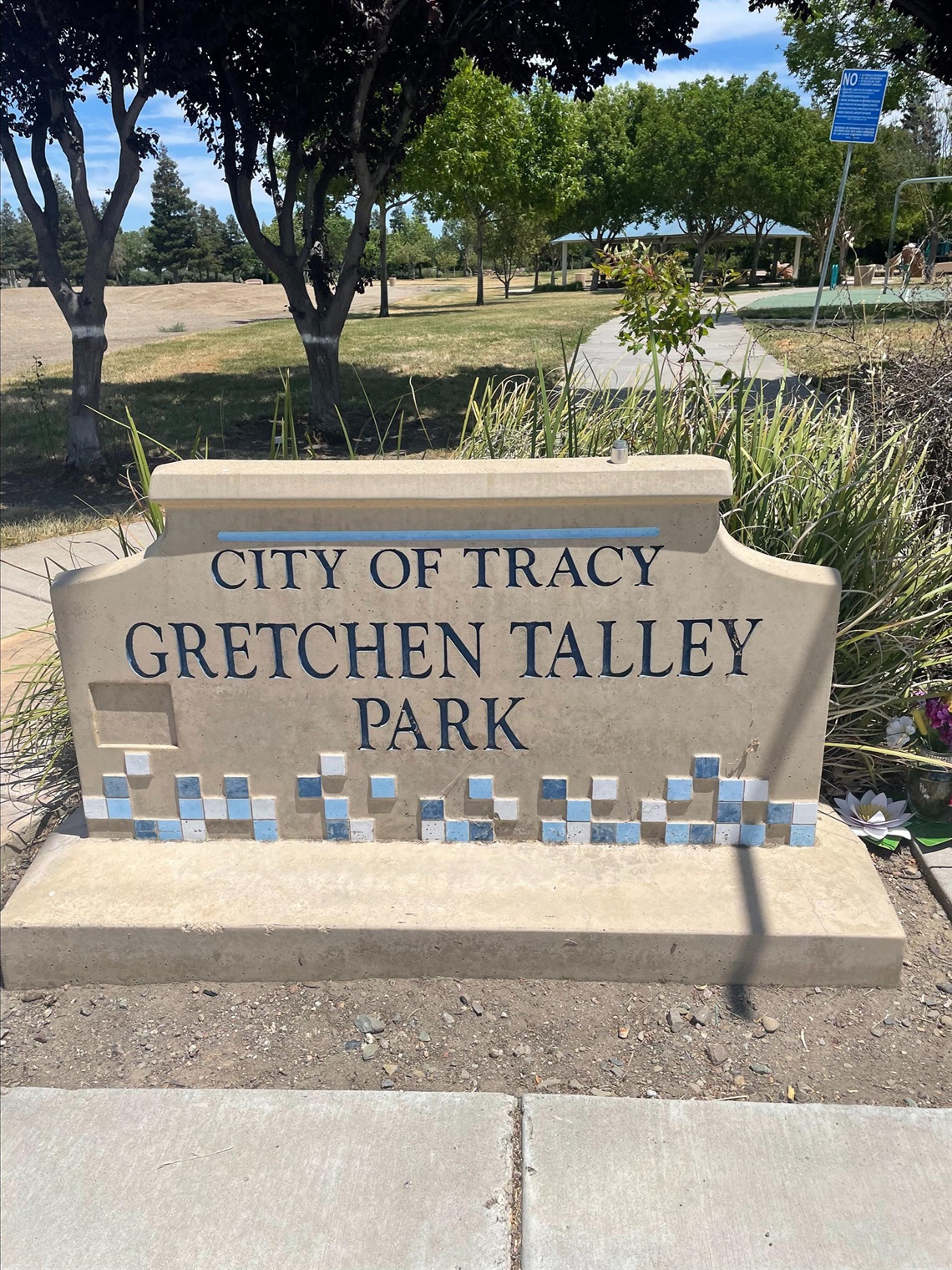Stone park entrance sign engraved with 