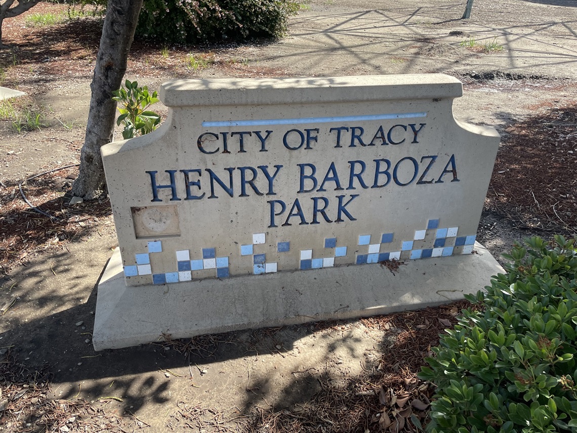 Stone park entrance sign engraved with 