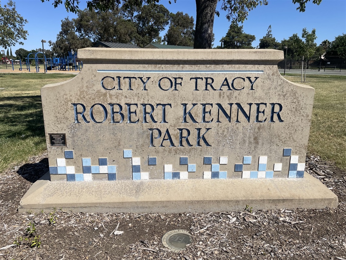 Stone park entrance sign engraved with 
