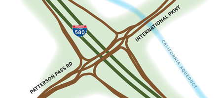 Map-style illustration of the I-580 interchange at Patterson Pass Road and International Parkway, showing connecting roadways and the nearby California Aqueduct.